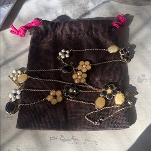 Kate Spade Long Gold Tone Chain with Flower and Oval Stone Accents w/ pouch